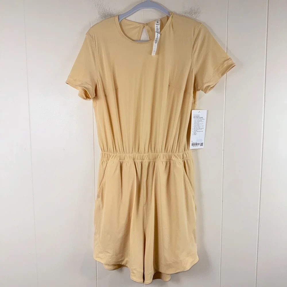 Lululemon Lightweight High Neck Romper Size 6 Tan Short Sleeve Open Back Pockets